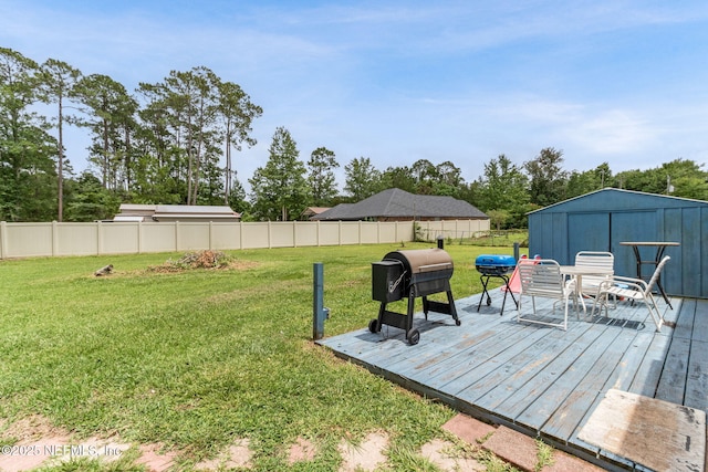 97150 Caravel Trl, Yulee, FL 32097 - view of yard featuring a wooden deck and an outbuilding