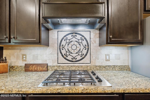 46 Gabacho Ct, Saint Augustine, FL 32095 - kitchen featuring stainless steel gas stovetop, dark brown cabinetry, and decorative backsplash