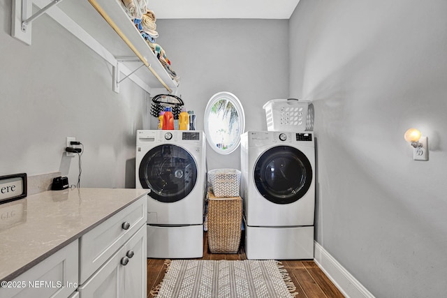 532 Atlantic Beach Ct, Atlantic Beach, FL 32233 - washroom with washing machine and clothes dryer, dark wood finished floors, and cabinet space