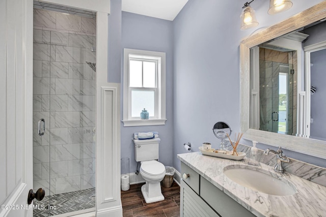 532 Atlantic Beach Ct, Atlantic Beach, FL 32233 - full bathroom featuring vanity, a shower stall, and wood finish floors