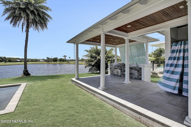 532 Atlantic Beach Ct, Atlantic Beach, FL 32233 - view of grassy yard featuring area for grilling, a water view, and a patio