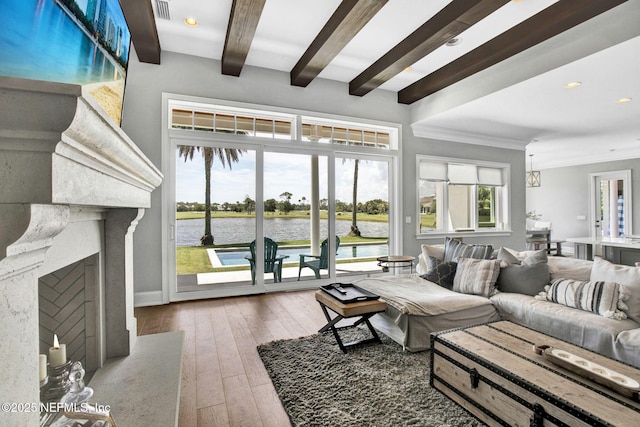 532 Atlantic Beach Ct, Atlantic Beach, FL 32233 - living room featuring a water view, a fireplace with flush hearth, beam ceiling, hardwood / wood-style floors, and recessed lighting