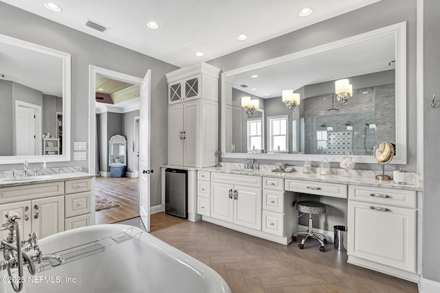 532 Atlantic Beach Ct, Atlantic Beach, FL 32233 - full bathroom with a stall shower, vanity, recessed lighting, a freestanding tub, and a chandelier