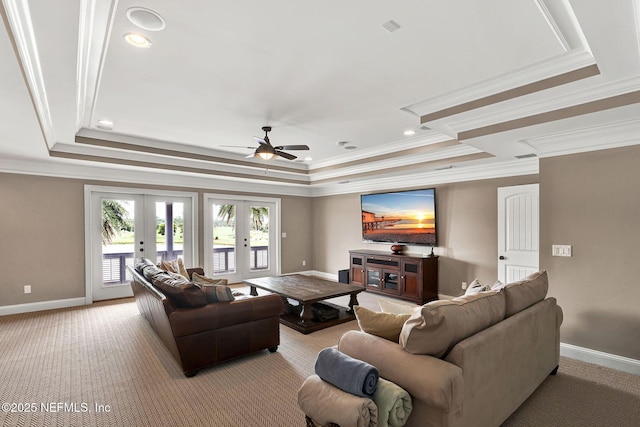 532 Atlantic Beach Ct, Atlantic Beach, FL 32233 - living room featuring a tray ceiling, french doors, ornamental molding, light colored carpet, and recessed lighting
