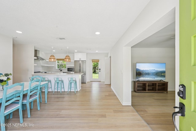 2619 Montreal St, Jacksonville, FL 32233 - dining room featuring light wood finished floors and recessed lighting