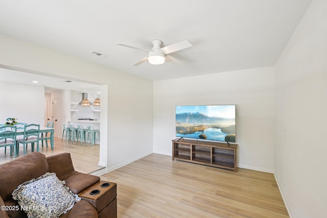 2619 Montreal St, Jacksonville, FL 32233 - living room with a ceiling fan and light wood-type flooring
