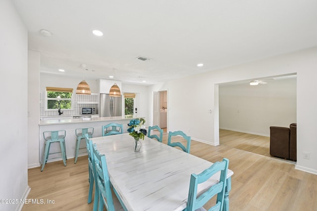 2619 Montreal St, Jacksonville, FL 32233 - dining area with light wood-style floors, recessed lighting, and ceiling fan