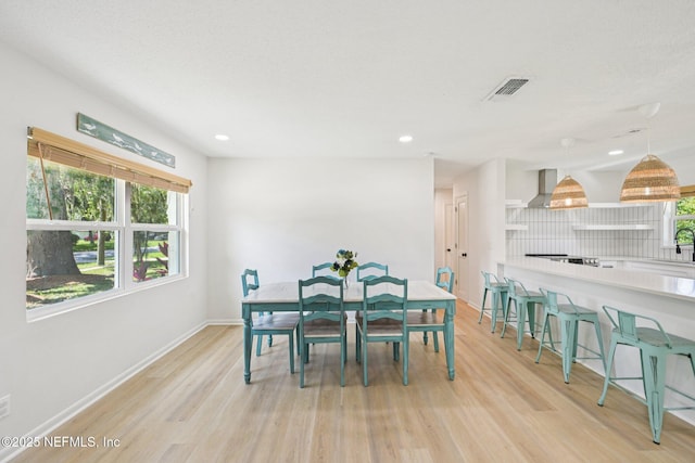 2619 Montreal St, Jacksonville, FL 32233 - dining area featuring light wood-style flooring and recessed lighting
