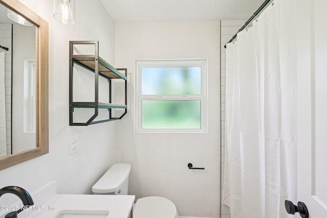 2619 Montreal St, Jacksonville, FL 32233 - full bath featuring vanity, a shower with shower curtain, and a textured ceiling
