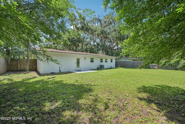 2619 Montreal St, Jacksonville, FL 32233 - back of house featuring a fenced backyard and a patio area
