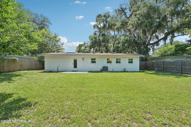 2619 Montreal St, Jacksonville, FL 32233 - back of house featuring a fenced backyard and a patio