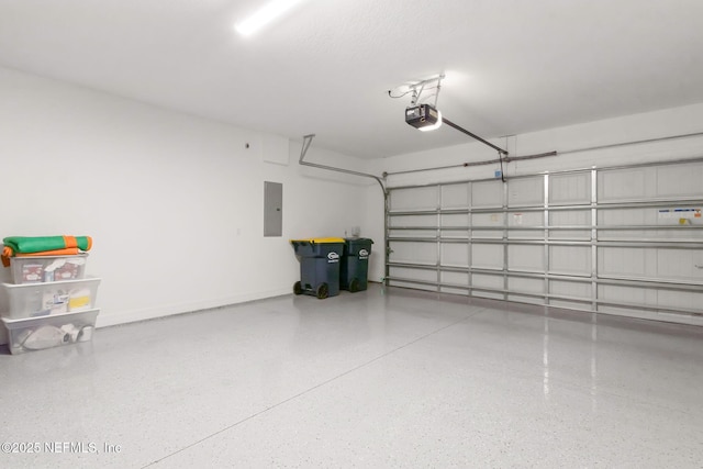350 Tranquil Trail Cir, Yulee, FL 32097 - garage featuring a garage door opener, electric panel, and baseboards