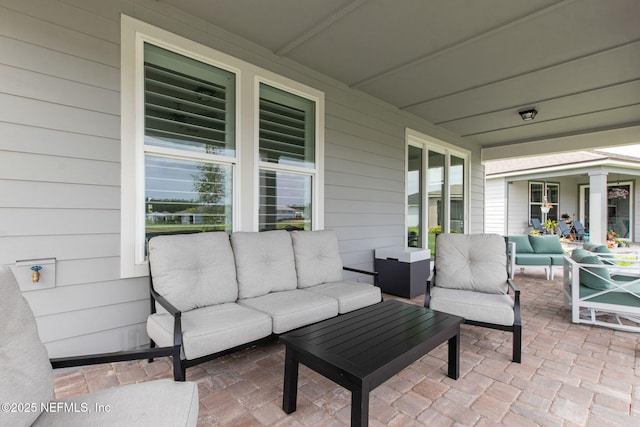 350 Tranquil Trail Cir, Yulee, FL 32097 - view of patio featuring an outdoor living space