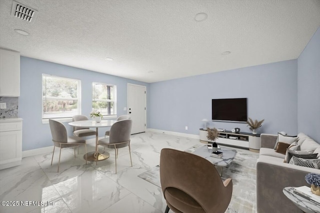 361 Mercury Dr, Orange Park, FL 32073 - living area with a textured ceiling and light marble finish floors