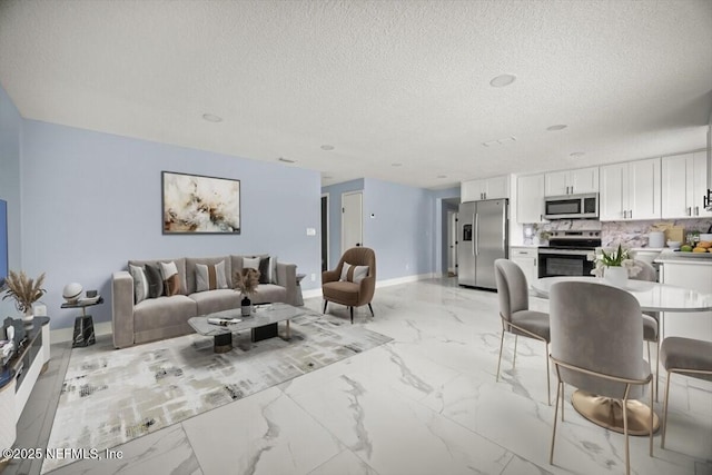 361 Mercury Dr, Orange Park, FL 32073 - living area featuring a textured ceiling and light marble finish floors