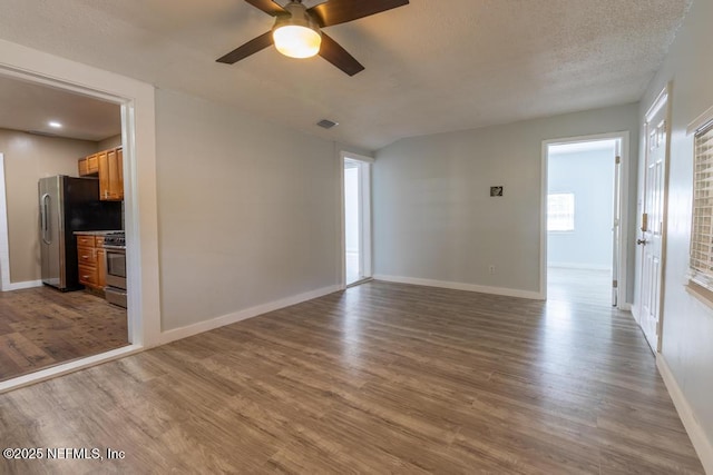 1514 Thomas St, Green Cove Springs, FL 32043 - empty room featuring ceiling fan, wood finished floors, and baseboards