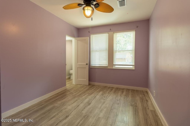 1514 Thomas St, Green Cove Springs, FL 32043 - spare room featuring light wood-style flooring, ceiling fan, and baseboards