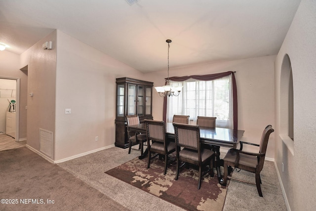 10121 SW 61st Terrace Rd, Ocala, FL 34476 - carpeted dining room featuring a chandelier and vaulted ceiling