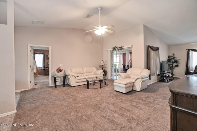 10121 SW 61st Terrace Rd, Ocala, FL 34476 - carpeted living area featuring vaulted ceiling, a ceiling fan, and plenty of natural light
