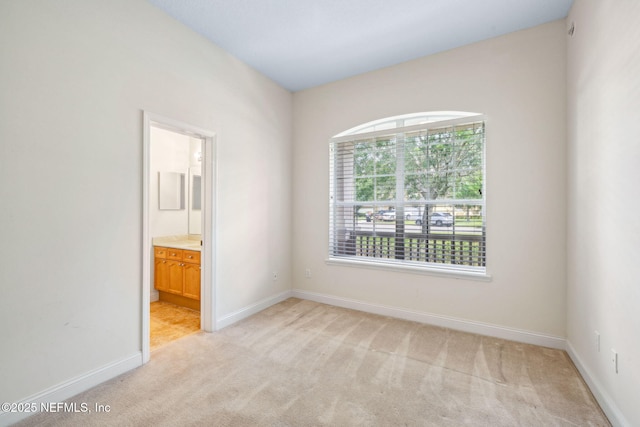 3975 Royal Pines Dr, Orange Park, FL 32065 - unfurnished room featuring light carpet and baseboards