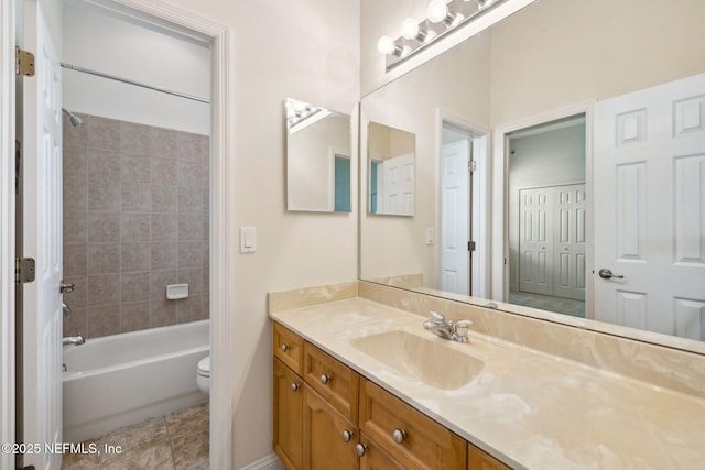 3975 Royal Pines Dr, Orange Park, FL 32065 - full bathroom featuring vanity, washtub / shower combination, and tile patterned floors