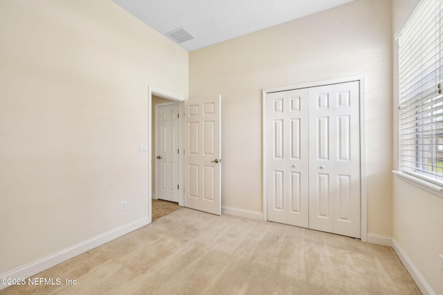 3975 Royal Pines Dr, Orange Park, FL 32065 - unfurnished bedroom with carpet floors and a closet