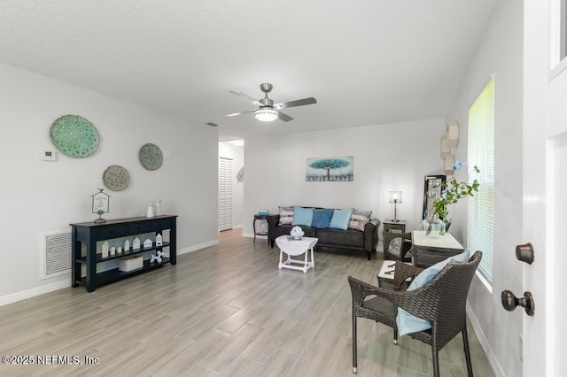 6217 Lobelia St, Jacksonville, FL 32209 - living area featuring ceiling fan and light wood-style flooring