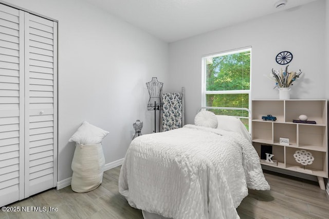 6217 Lobelia St, Jacksonville, FL 32209 - bedroom featuring wood finished floors and baseboards