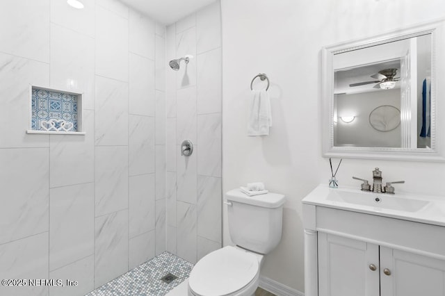 6217 Lobelia St, Jacksonville, FL 32209 - bathroom featuring vanity, a tile shower, and a ceiling fan
