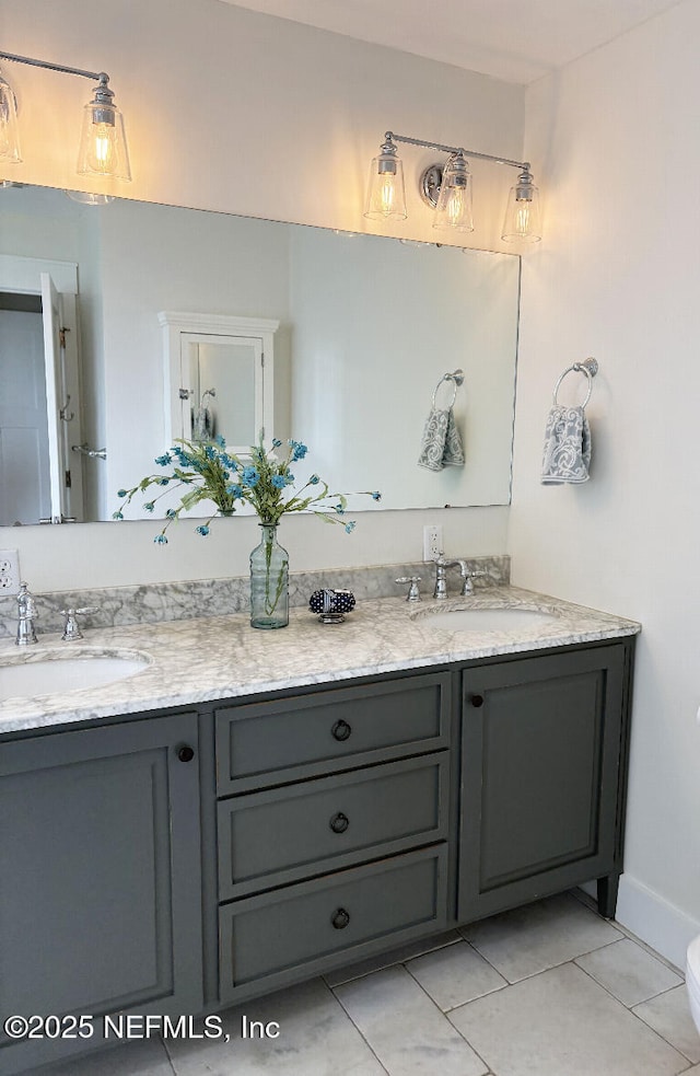 7 Sabor De Sal Rd, Saint Augustine, FL 32080 - bathroom featuring double vanity and tile patterned floors
