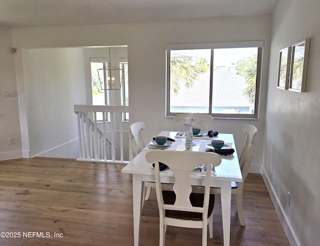 7 Sabor De Sal Rd, Saint Augustine, FL 32080 - dining space featuring wood finished floors and a chandelier