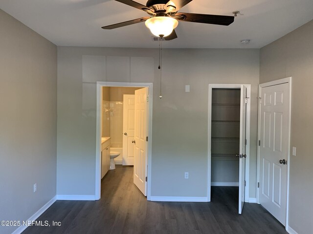 10961 Burnt Mill Rd Unit 917, Jacksonville, FL 32256 - unfurnished bedroom featuring dark wood finished floors, a closet, and a ceiling fan