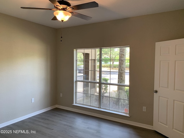 10961 Burnt Mill Rd Unit 917, Jacksonville, FL 32256 - unfurnished room with dark wood-style floors and ceiling fan