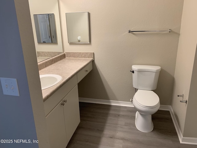 10961 Burnt Mill Rd Unit 917, Jacksonville, FL 32256 - half bathroom with vanity and wood finished floors