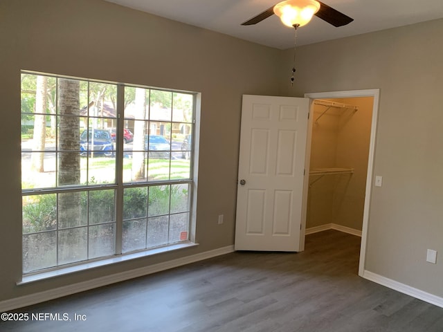 10961 Burnt Mill Rd Unit 917, Jacksonville, FL 32256 - spare room with healthy amount of natural light, a ceiling fan, and wood finished floors