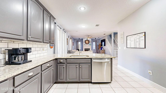 2032 Trailing Pines Way, Fleming Island, FL 32003 - kitchen featuring stainless steel dishwasher, a peninsula, gray cabinets, ceiling fan, and a sink