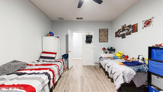 2032 Trailing Pines Way, Fleming Island, FL 32003 - bedroom featuring light wood-style floors and a ceiling fan