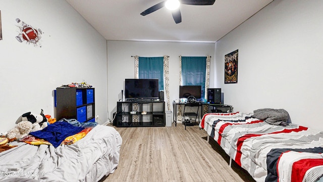 2032 Trailing Pines Way, Fleming Island, FL 32003 - bedroom featuring wood finished floors and a ceiling fan