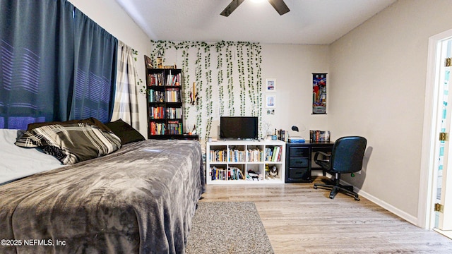 2032 Trailing Pines Way, Fleming Island, FL 32003 - bedroom featuring wood finished floors, baseboards, a desk, and ceiling fan