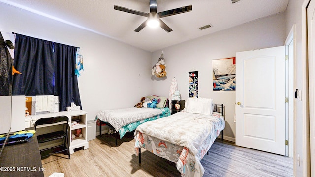 2032 Trailing Pines Way, Fleming Island, FL 32003 - bedroom featuring wood finished floors and ceiling fan