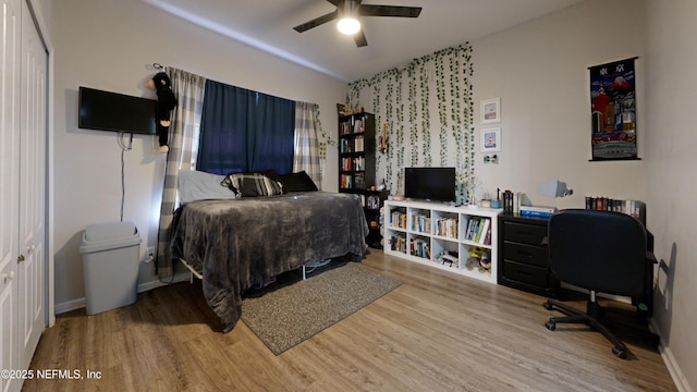 2032 Trailing Pines Way, Fleming Island, FL 32003 - bedroom featuring wood finished floors, baseboards, a ceiling fan, and an office area