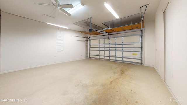2032 Trailing Pines Way, Fleming Island, FL 32003 - garage with baseboards and ceiling fan
