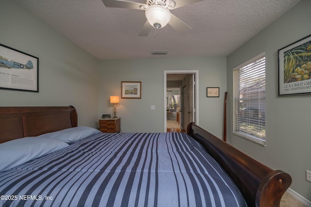 612 Nautical Way, Saint Augustine, FL 32080 - bedroom with a textured ceiling and a ceiling fan