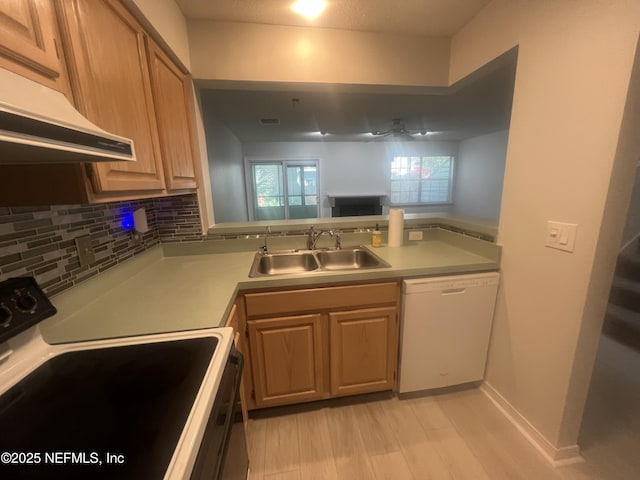1535 Summer Sands Dr, Neptune Beach, FL 32266 - kitchen featuring dishwasher, electric stove, under cabinet range hood, light countertops, and decorative backsplash