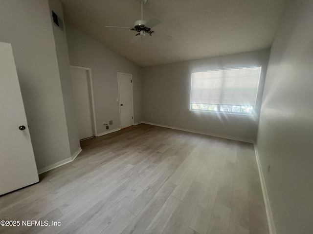 1535 Summer Sands Dr, Neptune Beach, FL 32266 - spare room featuring wood finished floors, ceiling fan, and lofted ceiling