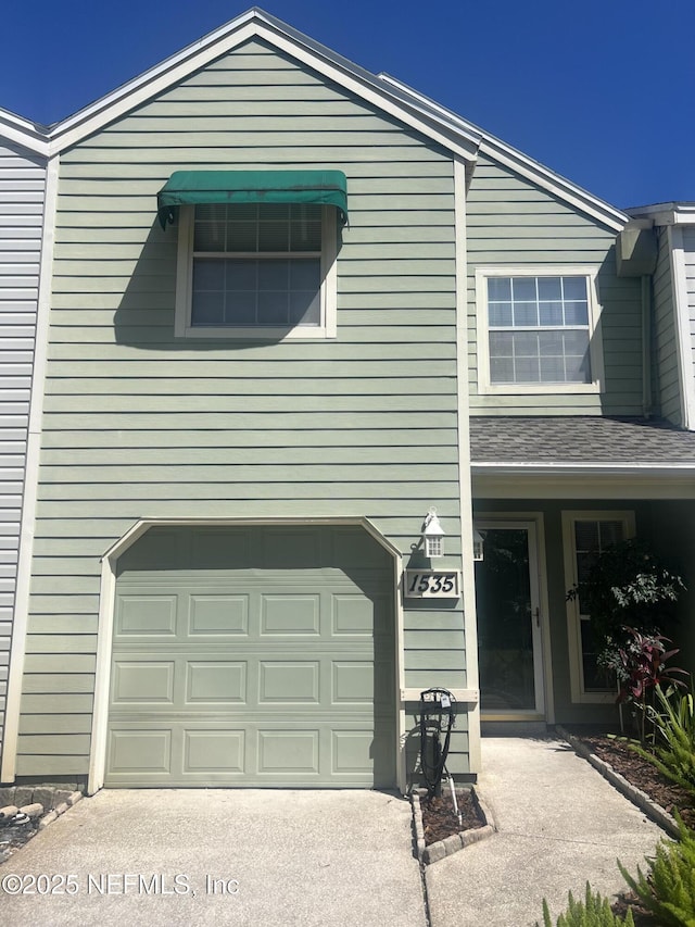 1535 Summer Sands Dr, Neptune Beach, FL 32266 - view of side of home with a garage