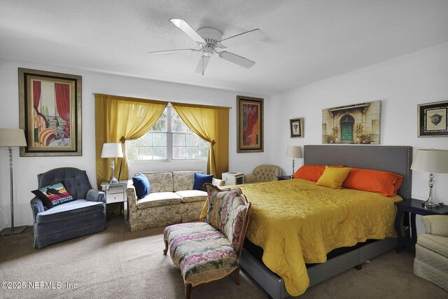 9901 Regency Square Blvd Unit 90, Jacksonville, FL 32225 - carpeted bedroom with a ceiling fan