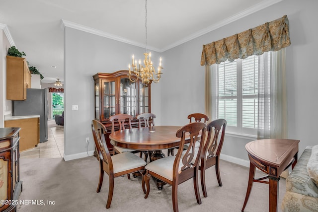 11582 Wynnfield Lakes Cir, Jacksonville, FL 32246 - dining area featuring crown molding, a chandelier, and light colored carpet