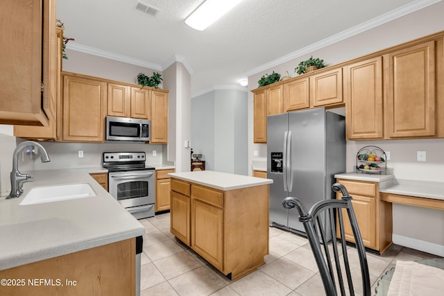 11582 Wynnfield Lakes Cir, Jacksonville, FL 32246 - kitchen featuring stainless steel appliances, ornamental molding, light countertops, a kitchen island, and light brown cabinets