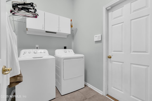 11582 Wynnfield Lakes Cir, Jacksonville, FL 32246 - laundry area with cabinet space, independent washer and dryer, and light marble finish floors